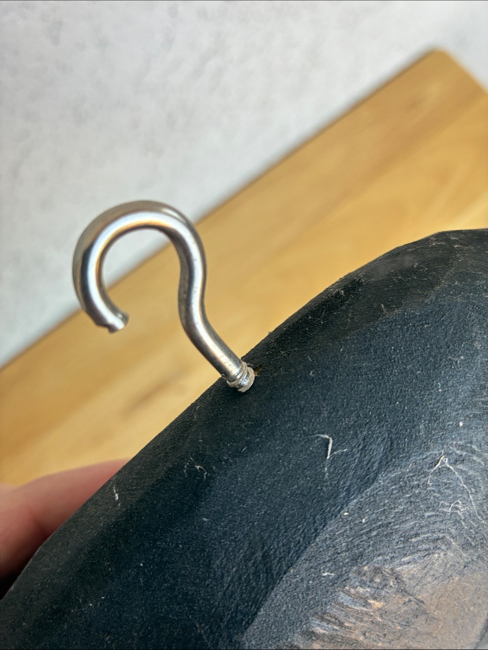 Strange hand carved folk art character with bland and orange clothes and a hook - Picture 12 of 13